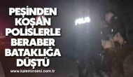 Peşinden koşan polislerle beraber bataklığa düştü